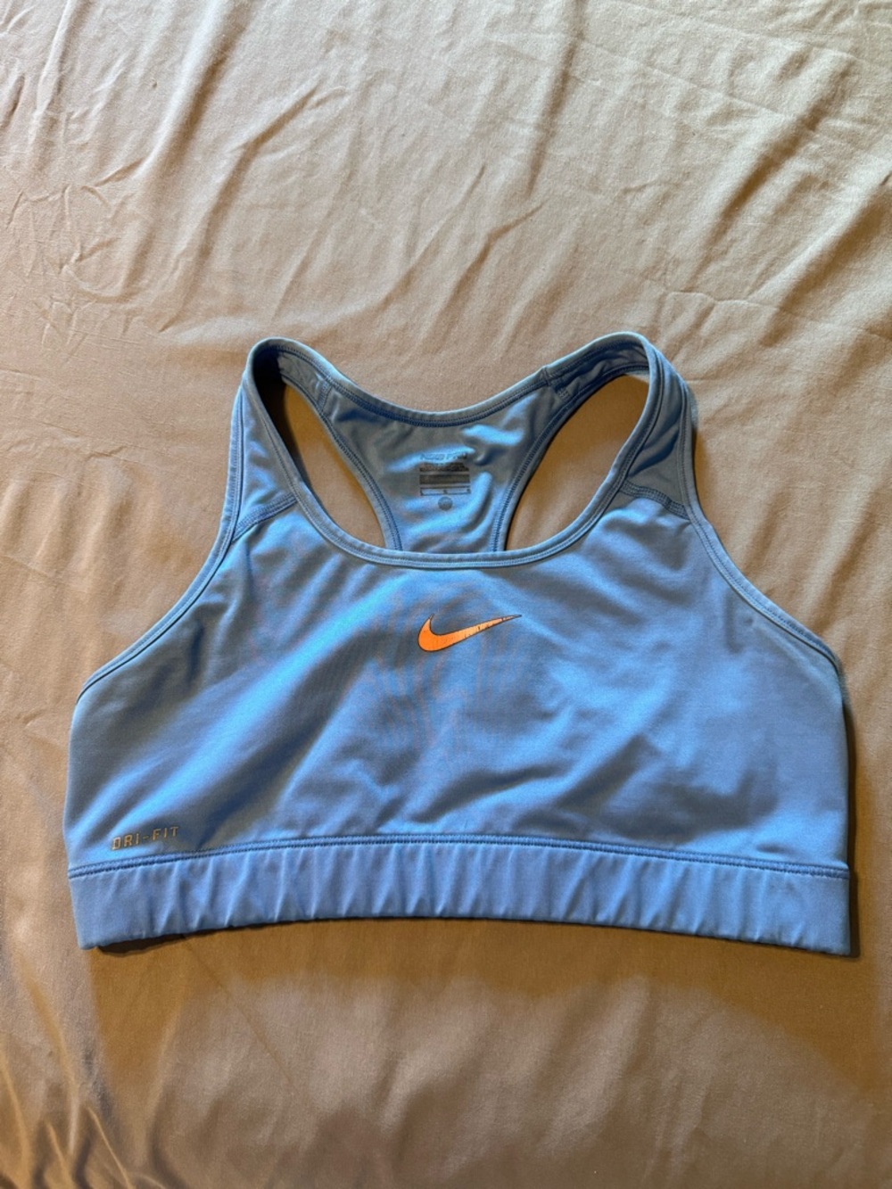Nike Sky Blue Sports Bra with Orange Swoosh
